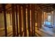 Unfinished basement with partial framing showing the potential for future expansion at 949 Nevis Way, Mcdonough, GA 30253