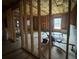 Unfinished basement ready for customization with framed walls and exposed insulation at 949 Nevis Way, Mcdonough, GA 30253