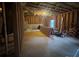 Unfinished basement showcasing the framing, concrete foundation, and potential for customization at 949 Nevis Way, Mcdonough, GA 30253