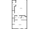 First floor plan featuring a garage, bedroom, bath, WIC, and hall, providing a clear layout of the living space at 5002 Davenport Pl, Roswell, GA 30075
