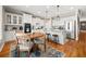 Bright kitchen with an island, stainless steel appliances, and a breakfast table at 5002 Davenport Pl, Roswell, GA 30075