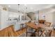 Open kitchen with granite counters, stainless appliances, and a cozy breakfast area at 5002 Davenport Pl, Roswell, GA 30075