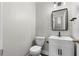 Powder room with a modern vanity, mirror, and lighting at 3119 Devauden Ct, Duluth, GA 30096