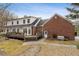 Spacious backyard features an inviting wooden deck, ideal for outdoor gatherings and entertaining at 4741 Covenant Way, Powder Springs, GA 30127