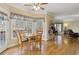 Charming breakfast nook with hardwood floors and view of backyard at 4741 Covenant Way, Powder Springs, GA 30127