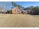 Spacious single-Gathering home showcasing its brick facade and well-manicured front lawn at 4741 Covenant Way, Powder Springs, GA 30127