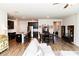 Open floor plan with hardwood floors seamlessly connecting the kitchen and living areas at 1277 Sunny Lake Dr, Lawrenceville, GA 30043
