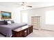 Comfortable main bedroom with soft carpet and ample natural light from two windows at 1277 Sunny Lake Dr, Lawrenceville, GA 30043