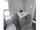 Bathroom featuring a toilet and vanity at 295 Lamden Ct, Lawrenceville, GA 30046