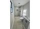 Bathroom featuring a tiled shower, toilet and vanity at 295 Lamden Ct, Lawrenceville, GA 30046