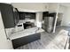 Modern kitchen featuring stainless steel appliances and marble countertops at 295 Lamden Ct, Lawrenceville, GA 30046