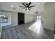 Spacious living room with lots of light from windows and sliding glass doors at 295 Lamden Ct, Lawrenceville, GA 30046