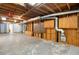 Unfinished basement with concrete floor, exposed ceiling, and utility connections at 750 Parkway Se Dr, Smyrna, GA 30080