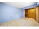 Small bedroom with light blue walls and closet at 750 Parkway Se Dr, Smyrna, GA 30080