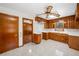 Cozy kitchen featuring classic wood cabinets, white countertops, and modern lighting at 750 Parkway Se Dr, Smyrna, GA 30080