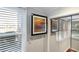 Bedroom detail showcasing a large window, closet with mirrored doors, and neutral wall decor at 64 Montre Nw Sq, Atlanta, GA 30327
