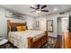 The main bedroom features a ceiling fan, and a doorway leading to the bathroom at 64 Montre Nw Sq, Atlanta, GA 30327