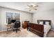 Cozy bedroom with desk and ceiling fan offers a comfortable and functional space at 79 Mountain View Ct, Dallas, GA 30157