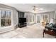 Bright living room features large windows offering lots of natural light and beautiful outdoor views at 79 Mountain View Ct, Dallas, GA 30157