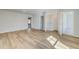 Spacious bedroom with walk-in closet, washer/dryer hookups, and wood flooring at 200 Haverling Pass, Hampton, GA 30228