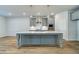Kitchen island with pendant lighting and white countertop at 200 Haverling Pass, Hampton, GA 30228
