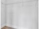 Walk-in closet with wire shelving and carpet at 587 Red Clay Farm Ln, Suwanee, GA 30024