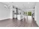 This open floor plan has hardwood floors, a spacious island and plentiful lighting at 587 Red Clay Farm Ln, Suwanee, GA 30024