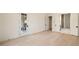 Open bedroom with ensuite bathroom and walk-in closet entrances, hardwood floors and French door at 906 Fairfield Dr, Marietta, GA 30068