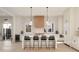Open kitchen with a large island, stylish bar stools, and stainless steel appliances at 906 Fairfield Dr, Marietta, GA 30068