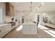 Open-concept kitchen with stainless steel appliances and a view to the living room at 906 Fairfield Dr, Marietta, GA 30068