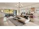 Open-concept living room showcases hardwood floors, modern furniture, and a sliding glass door at 906 Fairfield Dr, Marietta, GA 30068