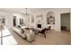 Bright living room features a stone fireplace, built-in shelving, and hardwood floors at 906 Fairfield Dr, Marietta, GA 30068