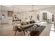 Open-concept living space with hardwood floors and ample seating at 906 Fairfield Dr, Marietta, GA 30068
