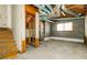 Unfinished basement with visible framework and concrete floor at 4055 S Bogan Rd, Buford, GA 30519