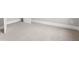 Unfurnished bedroom in a new home features neutral carpet and paint at 577 Red Clay Farm Ln, Suwanee, GA 30024