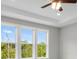 Bright bedroom with tray ceilings, and lots of natural light at 577 Red Clay Farm Ln, Suwanee, GA 30024