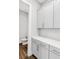 Butler's Pantry with white cabinetry and quartz countertops at 577 Red Clay Farm Ln, Suwanee, GA 30024
