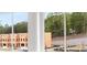 A new development can be seen from a window in this new home at 577 Red Clay Farm Ln, Suwanee, GA 30024
