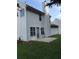 Rear view of house with patio, siding, and yard at 2143 Gwinn Dr, Norcross, GA 30071