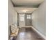 Mud room hallway with hard wood floors, neutral walls, and entry to the outside at 385 Arthur Sw St, Atlanta, GA 30310