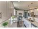 Modern kitchen featuring white cabinets, stainless steel appliances, granite countertops and updated lighting at 385 Arthur Sw St, Atlanta, GA 30310