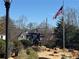 This town features a military statue and an American flag at 475 Letchas Ln, Alpharetta, GA 30009