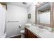 Relaxing bathroom featuring tub/shower combo, vanity, and soft lighting at 8834 Applegate Ln, Atlanta, GA 30350