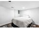 Cozy bedroom featuring minimalist decor, plush rug and carpet, creating a serene space at 8834 Applegate Ln, Atlanta, GA 30350