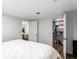 Bright bedroom featuring a closet and an adjacent seating area at 8834 Applegate Ln, Atlanta, GA 30350