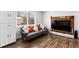 Basement living room with wood-look flooring and a large window at 8834 Applegate Ln, Atlanta, GA 30350