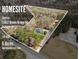 Picturesque aerial view of a 6-acre lot featuring mature trees and a custom home at 11637 Brown Bridge Rd, Covington, GA 30016