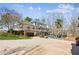 Expansive home featuring a two-story deck, in-ground pool, and a large driveway at 11637 Brown Bridge Rd, Covington, GA 30016