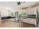 Updated kitchen featuring custom cabinets, granite countertops, and stainless steel appliances at 11637 Brown Bridge Rd, Covington, GA 30016