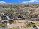 Aerial view of the home in a tranquil neighborhood surrounded by lush greenery and mature trees at 1350 Bluefield Sw Dr, Atlanta, GA 30310